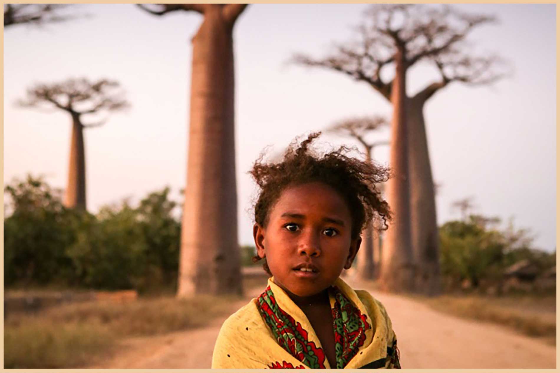 Girl in traditional clothing at Baobab Avenue