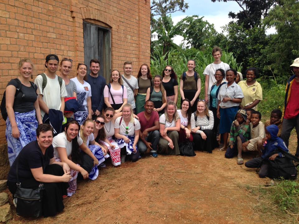 Group portrait with a Malagasy community